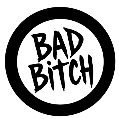 Black circular decal with bold hand-lettered text reading “Bad Bitch.”