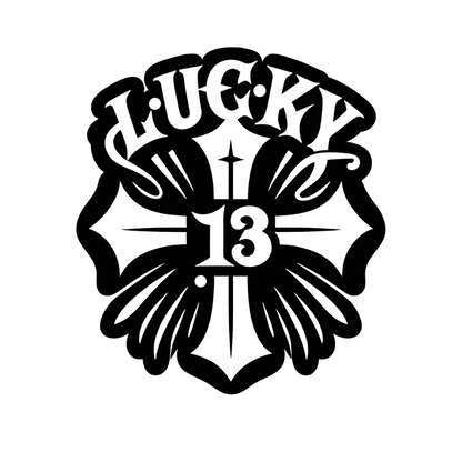 Black and white ornamental decal featuring the words Lucky 13 in bold vintage tattoo-style lettering with a starburst design.