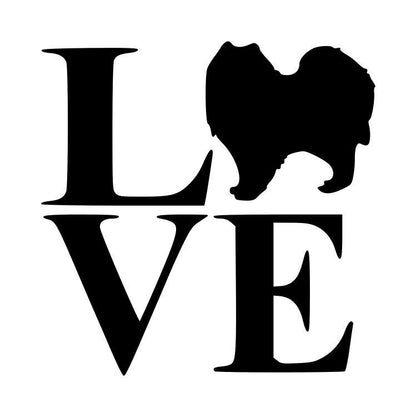 Black silhouette of a fluffy Pomeranian dog forming the O in the word LOVE.