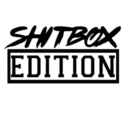 Black and white decal reading “SHITBOX” in bold brush lettering above “EDITION” inside a rectangular border.