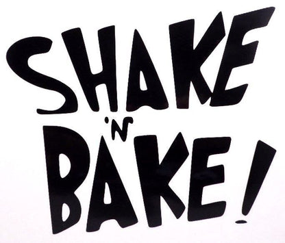 Black Shake 'n Bake text decal with an exclamation mark on a white background.
